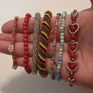 #835.   7 Piece Assorted Multi Colored Glass Seed Bead Bracelet Bundle